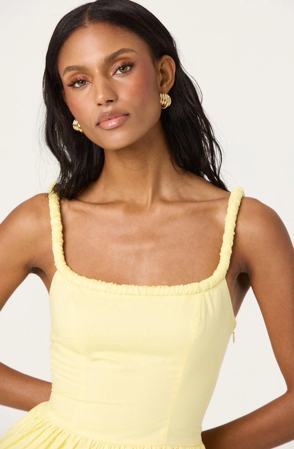 Sleeveless Bubble Hem Peplum Top